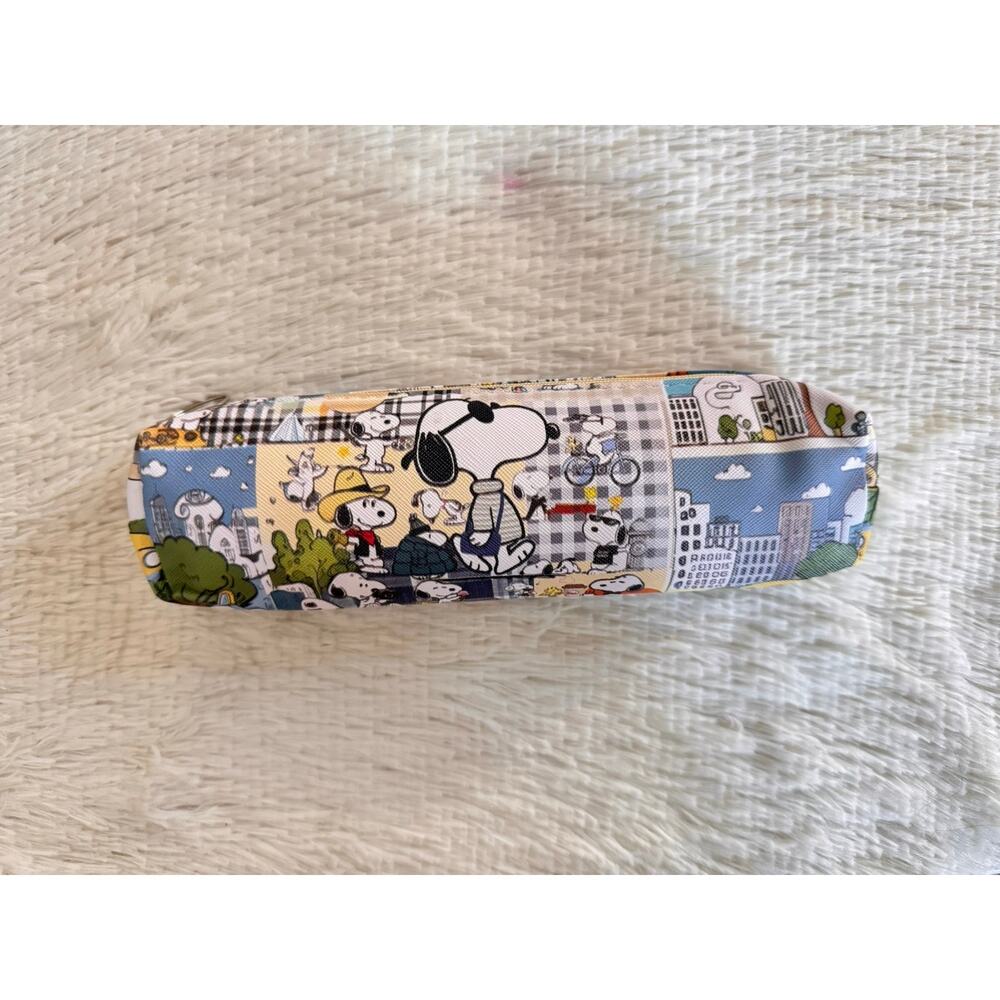 Peanuts Snoopy pencil case zipper with cartoon characters in a cityscape